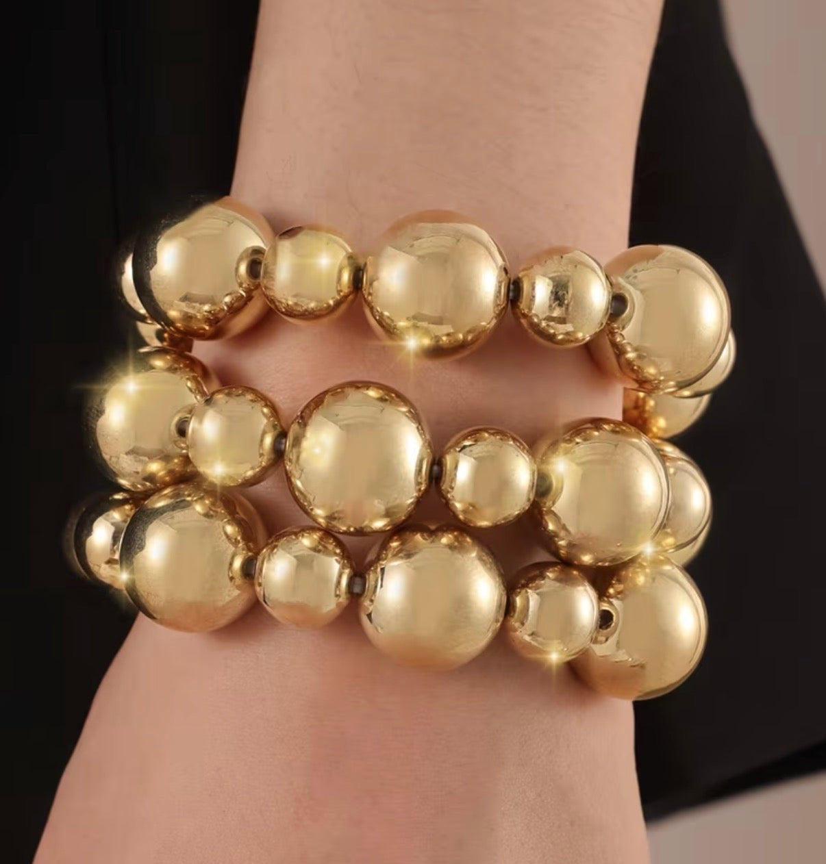 Chunky gold beaded bracelets